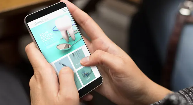 Patient reviewing Cherry dental financing options on a phone