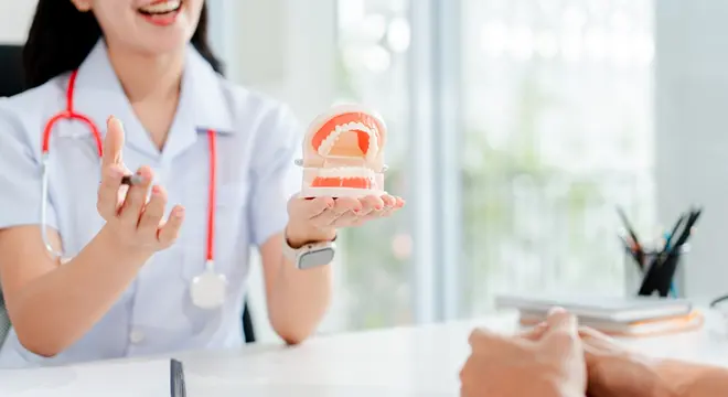 Dentist in Riverview, FL discussing treatment options with a patient